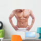 Muscular man in towel, isolated on white 