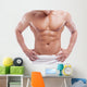 Muscular man in towel, isolated on white 