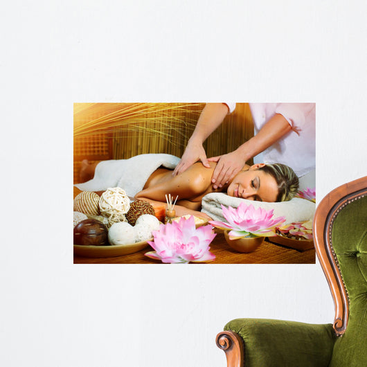 Beautiful woman having massage. Wall Mural