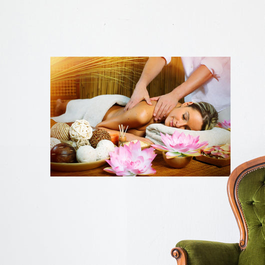 Beautiful woman having massage. Wall Mural