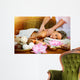 Beautiful woman having massage. Wall Mural
