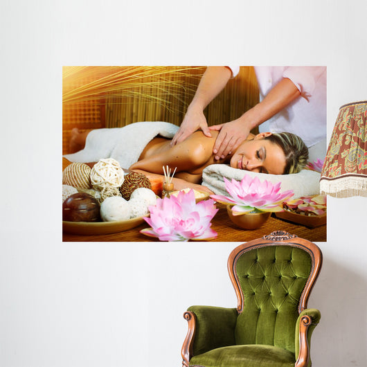 Beautiful woman having massage. Wall Mural