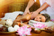 Beautiful woman having massage. Wall Mural