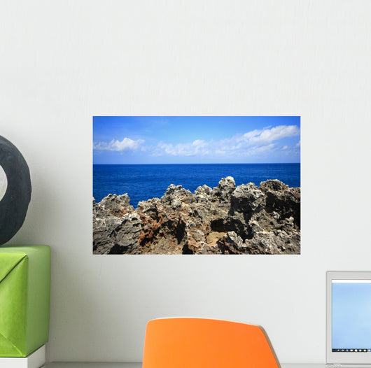 Rock sea ocean  island blue sky Wall Mural