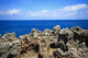 Rock sea ocean  island blue sky Wall Mural