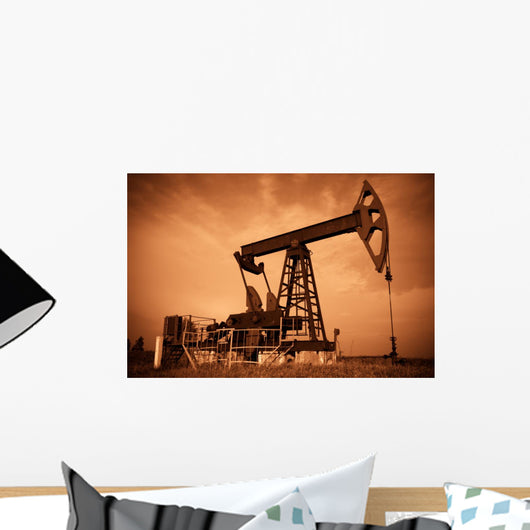 Oil pump jack. Red filtered image. Wall Mural