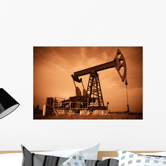 Oil pump jack. Red filtered image. Wall Mural