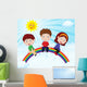 Happy Kids Sitting on Rainbow Wall Mural