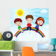 Happy Kids Sitting on Rainbow Wall Mural