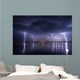Thunderstorm and lightnings in night over a lake with reflaction 