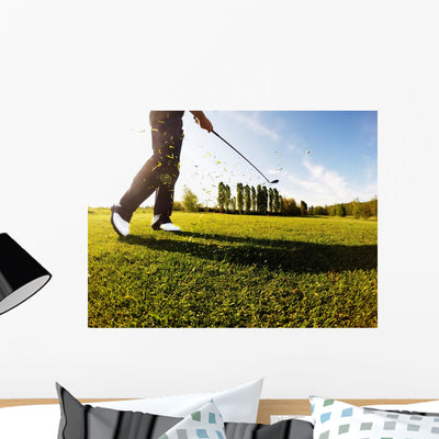 Golfer Performs Golf Shot Wall Decal shown on a wall