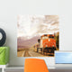 Freight train in Canadian rockies. Wall Mural