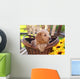 Adorable Poodle Mix Puppy Sitting in Basket with Sunflowers Wall Mural
