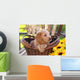 Adorable Poodle Mix Puppy Sitting in Basket with Sunflowers Wall Mural