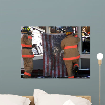 Firemen Raising American Flag shown on a wall