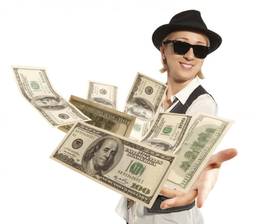 woman in cap throwing dollar Wall Decal
