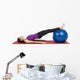Young fitness woman working her abs with pilates ball Wall Decal