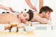 Couple Receiving Lastone Therapy