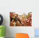 Sitting Ridgeback holds in its mouth pheasant Wall Mural