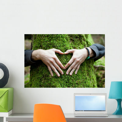 Heart Hand Tree Wall Decal shown on a wall