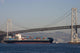 Container Ship under Bridge Wall Mural