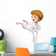 A brave boy doing his karate moves Wall Decal