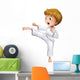 A brave boy doing his karate moves Wall Decal