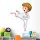A brave boy doing his karate moves Wall Decal