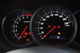Closeup shot of a speedometer and tachometer of a modern car. Wall Mural