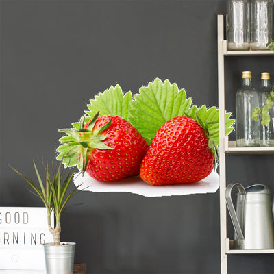 Ripe Strawberries with Leaves shown on a wall