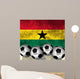Footballs on top of flag - Ghana Wall Mural
