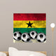 Footballs on top of flag - Ghana Wall Mural