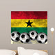 Footballs on top of flag - Ghana Wall Mural