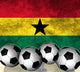 Footballs on top of flag - Ghana Wall Mural