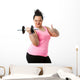 Overweight fitness girl doing thumbs up. Wall Decal
