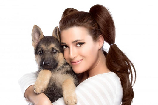 Cute Young Woman with a Puppy Dog Wall Decal