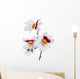 four white orchid flowers with pink and yellow center Wall Decal