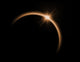 Solar eclipse in orange color Wall Mural
