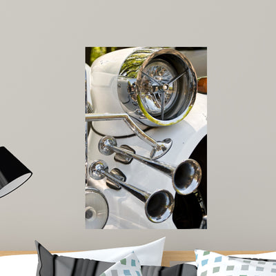 Headlight and Horn Retro shown on a wall