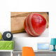 Cricket ball and bat Wall Mural