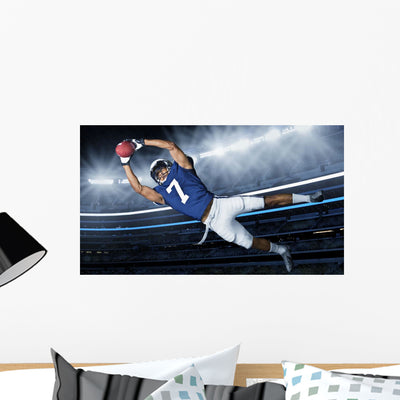 American Football Touchdown Catch shown on a wall