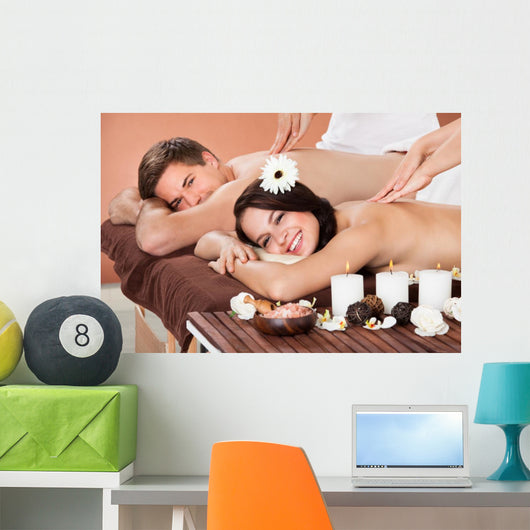 Couple Receiving Shoulder Massage At Spa Wall Mural