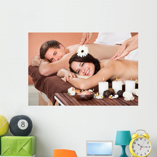 Couple Receiving Shoulder Massage At Spa Wall Mural