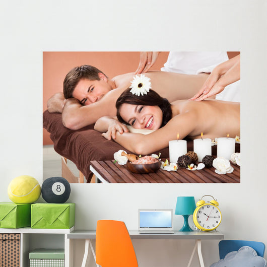 Couple Receiving Shoulder Massage At Spa Wall Mural