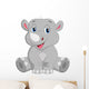 Happy rhino cartoon sitting Wall Decal