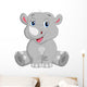Happy rhino cartoon sitting Wall Decal
