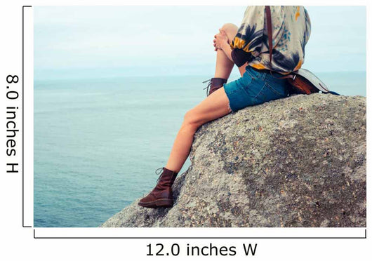 Young Woman Sitting Rock Wall Mural