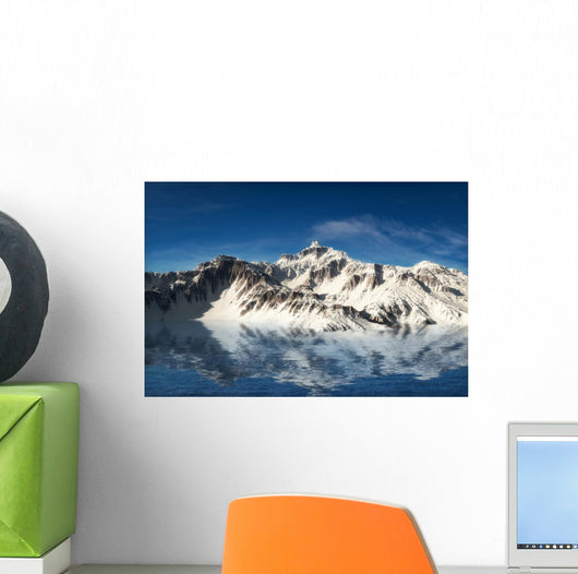 Majestic snow covered mountains reflecting in the water Wall Mural