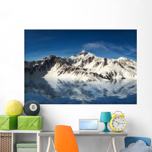 Majestic snow covered mountains reflecting in the water Wall Mural
