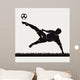 Silhouette Footballer Beating Ball